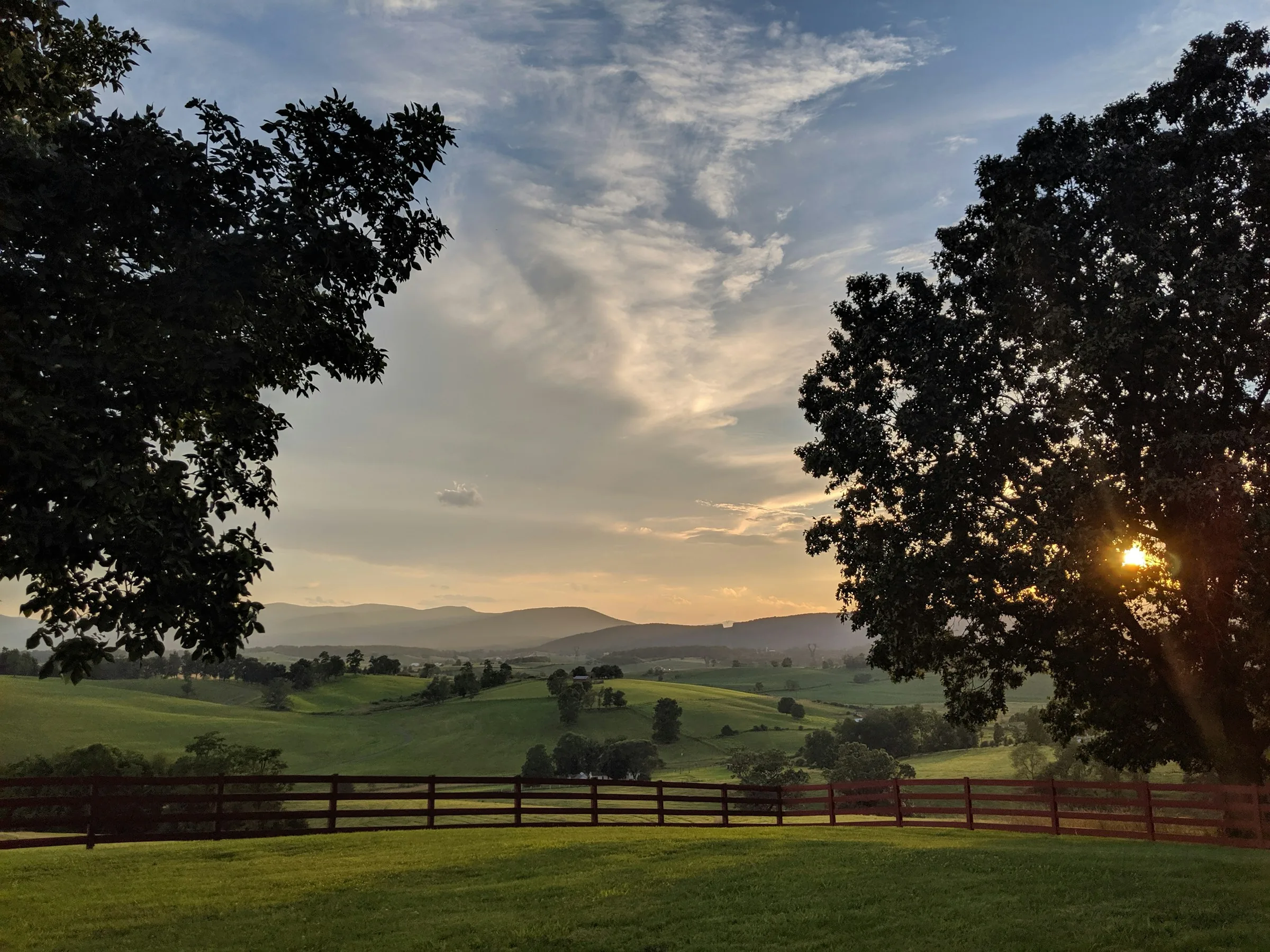 Sunset over farmland and the Blue Ridge near Churchville in the Shenandoah Valley